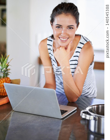 Kitchen, portrait and woman search with laptop for cooking, recipe and tutorial guide for dinner. Happy, chef and girl typing on computer and learning from blog about nutrition, diet and information Kitchen, portrait and woman search with laptop for cooking, recipe and tutorial guide for dinner. Happy, chef and girl typing on computer and learning from blog about nutrition, diet and information 140545388