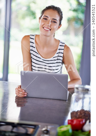 Kitchen, portrait and woman search with laptop for cooking, recipe and food guide for dinner. Happy, chef and girl typing on computer and learning from blog about nutrition, diet and information 140545521