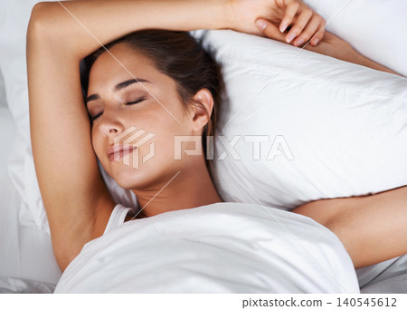 Pillow, relax and woman sleeping on bed, bedroom and peace on mattress, soft and comfortable. Home, tired and female person rest for fatigue, health and break for weekend in house with cozy duvet Pillow, relax and woman sleeping on bed, bedroom and peace on mattress, soft and comfortable. Home, tired and female person rest for fatigue, health and break for weekend in house with cozy duvet 140545612