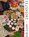 Traditional breads and pastries at Kazanluk Rose Festival. Bread, banitsa, pogacha, cakes, sweets are displayed on table, Kazanluk, Bulgaria. Bakery, heritage, bread culture, bulgarian cuisine 140545733
