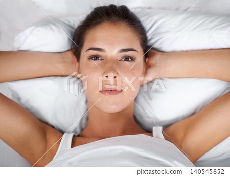 Portrait, serious and woman bed thinking with hands on head, bedroom and wake up in morning. House, pillow and female person relax with comfort on soft mattress with duvet for girl and above 140545852