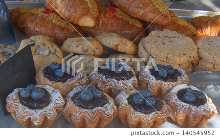 Fresh Artisanal Pastries Croissants biscuits and Blueberry Tarts at Embassy festival in Prague Fresh Artisanal Pastries Croissants biscuits and Blueberry Tarts at Embassy festival in Prague 140545952