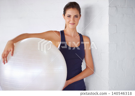 Portrait, woman and ball for fitness, yoga and pilates as sport, workout and training for wellness. Confident, female person and equipment for exercise, health and energy in core balance and muscle Portrait, woman and ball for fitness, yoga and pilates as sport, workout and training for wellness. Confident, female person and equipment for exercise, health and energy in core balance and muscle 140546318