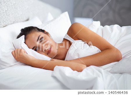 Wake up, relax and portrait of woman in bed with wellness, confidence and happy morning in apartment. Face, smile and girl on bedroom pillow for healthy sleep, weekend comfort or natural rest in home Wake up, relax and portrait of woman in bed with wellness, confidence and happy morning in apartment. Face, smile and girl on bedroom pillow for healthy sleep, weekend comfort or natural rest in home 140546436