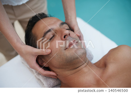 Outdoor, spa and man relax for facial massage on table in hotel, calm and care for body in vacation. Holiday, luxury and male person on break for weekend, resort and lodge with treatment for skincare Outdoor, spa and man relax for facial massage on table in hotel, calm and care for body in vacation. Holiday, luxury and male person on break for weekend, resort and lodge with treatment for skincare 140546500