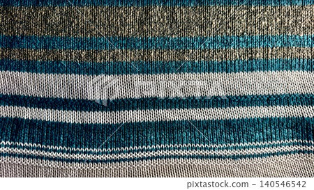 striped knit fabric closeup reveals intricate ribbed texture in cozy teal beige and white horizontal layers striped knit fabric closeup reveals intricate ribbed texture in cozy teal beige and white horizontal layers 140546542