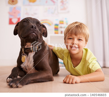 Boy child, dog and portrait, happy with pet and friends in playroom for love and loyalty at home. Youth, kid and bonding with puppy, adoption or foster for animal care and relax on floor with smile Boy child, dog and portrait, happy with pet and friends in playroom for love and loyalty at home. Youth, kid and bonding with puppy, adoption or foster for animal care and relax on floor with smile 140546603