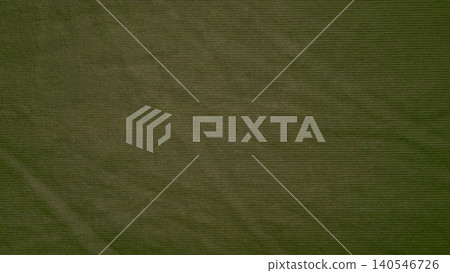 olive green corduroy fabric texture background showing detailed ribbed cotton textile waves with subtle shadows and organic lighting olive green corduroy fabric texture background showing detailed ribbed cotton textile waves with subtle shadows and organic lighting 140546726