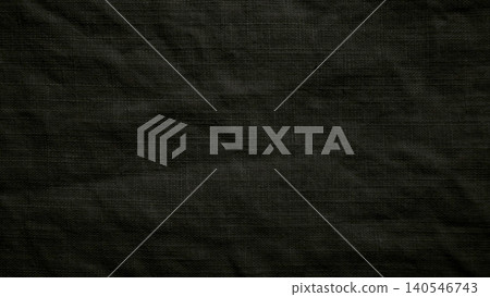 dark black wrinkled linen fabric texture showing organic weave patterns in moody low light dark black wrinkled linen fabric texture showing organic weave patterns in moody low light 140546743