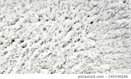 white textured carpet provides tactile softness in a bright minimalist interior overhead background closeup white textured carpet provides tactile softness in a bright minimalist interior overhead background closeup 140546886