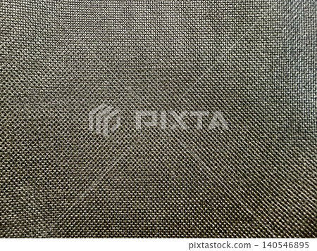 dark olive green synthetic fabric texture displays intricate woven grid pattern creating subtle organic gradient 140546895