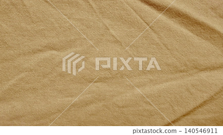 textured beige linen fabric close up shows natural creased canvas background for sustainable organic textile design textured beige linen fabric close up shows natural creased canvas background for sustainable organic textile design 140546911