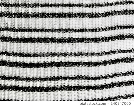 textured striped white fabric weave creates rhythmic monochrome pattern evoking cozy minimalist warmth textured striped white fabric weave creates rhythmic monochrome pattern evoking cozy minimalist warmth 140547000