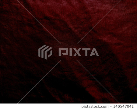 burgundy linen fabric texture shows dark maroon waves creating moody shadows in a minimalist flat lay composition burgundy linen fabric texture shows dark maroon waves creating moody shadows in a minimalist flat lay composition 140547041