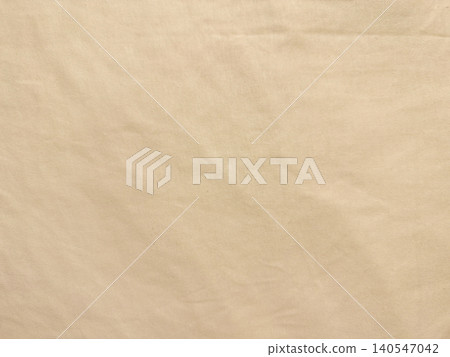 beige fabric background features minimalist organic cotton texture showing subtle woven lines and soft shadows beige fabric background features minimalist organic cotton texture showing subtle woven lines and soft shadows 140547042