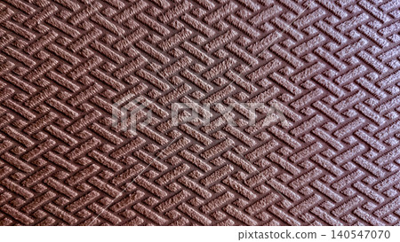 brown woven fabric background displays elegant basketweave pattern casting subtle shadow over sophisticated textile surface brown woven fabric background displays elegant basketweave pattern casting subtle shadow over sophisticated textile surface 140547070