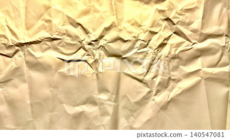 crumpled beige paper texture exposes intensely chaotic folds deep creases and warm abstract shadows crumpled beige paper texture exposes intensely chaotic folds deep creases and warm abstract shadows 140547081