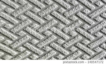 raised diamond lattice pattern gray textural fabric knit textile background for cozy sustainable wellness decor raised diamond lattice pattern gray textural fabric knit textile background for cozy sustainable wellness decor 140547172
