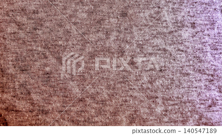 knitted fabric texture macro closeup captures intricate details in warm earthy browns blending into soft purple tones knitted fabric texture macro closeup captures intricate details in warm earthy browns blending into soft purple tones 140547189