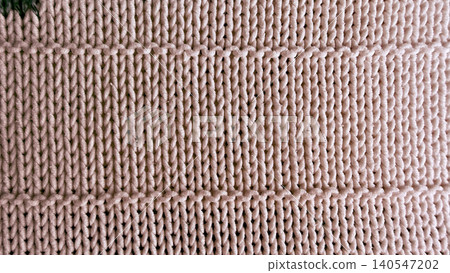 cozy rib knit fabric reveals soft yarn texture in delicate beige tone with intricate horizontal detailing cozy rib knit fabric reveals soft yarn texture in delicate beige tone with intricate horizontal detailing 140547202