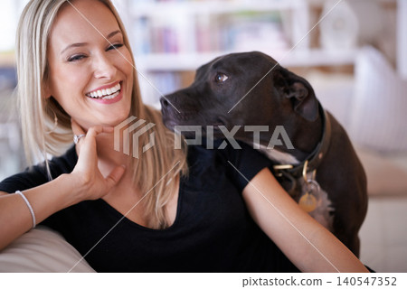 Happy, portrait or woman and dog on a sofa with love, are and bonding at home together. Pets, face and female person relax with pitbull puppy in a living room with security, trust or foster safety Happy, portrait or woman and dog on a sofa with love, are and bonding at home together. Pets, face and female person relax with pitbull puppy in a living room with security, trust or foster safety 140547352