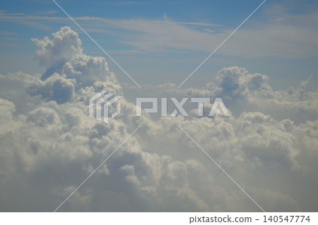 Soft white clouds in blue sky background Soft white clouds in blue sky background 140547774