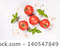 Fresh tomatoes with basil leaves and pink salt 140547849