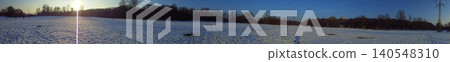 Full circle panoramic: snow-covered meadow with sunset causing light damage. Full circle panoramic: snow-covered meadow with sunset causing light damage. 140548310