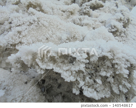 White frost forming beautiful structures on frozen snow. White frost forming beautiful structures on frozen snow. 140548617