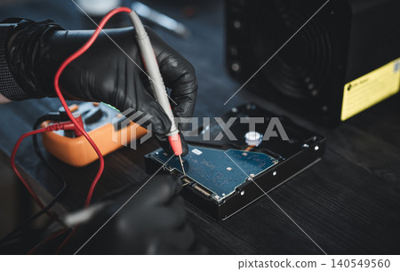 Repair Technician Testing Broken Hdd Hard Disk In Computer Service Center Workshop Repair Technician Testing Broken Hdd Hard Disk In Computer Service Center Workshop 140549560