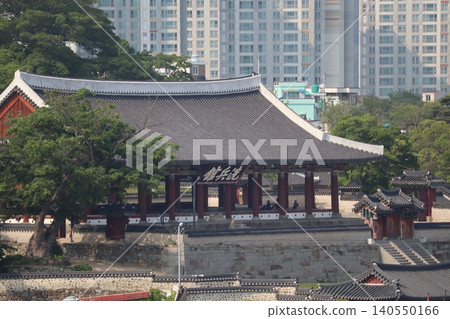 Traditional Korean Pavilion Amid Modern Cityscape Traditional Korean Pavilion Amid Modern Cityscape 140550166