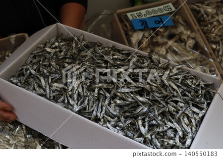 Dried Anchovies in Market Box with Price Tag Dried Anchovies in Market Box with Price Tag 140550183