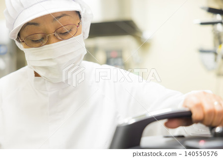 Part-time staff working in white coats Part-time staff working in white coats 140550576