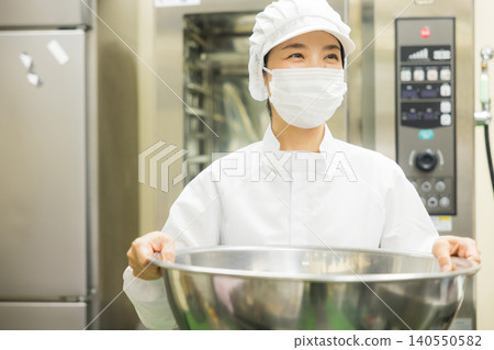 Part-time staff working in white coats Part-time staff working in white coats 140550582