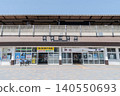 The modern, single-story station building and the spacious, open rotary in front of Kashima Jingu Station (Kashima City, Ibaraki Prefecture) 140550693