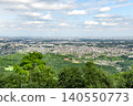 A spectacular view from the hiking trail of Mt. Hiwada, showing the winding Kinchakuda area below and the distant, hazy mountain range (Hidaka City, Saitama Prefecture). 140550773