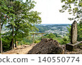 A panoramic view of the Kinchakuda settlement and the silhouette of a city stretching out in the distance from a scenic viewpoint on Mt. Hiwada (Hidaka City, Saitama Prefecture) 140550774