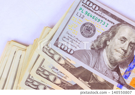 Different US dollar denominations of cash are placed on flat surface Different US dollar denominations of cash are placed on flat surface 140550807