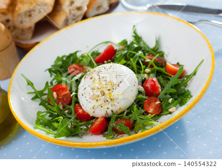 Fresh salad with Burrata cheese Fresh salad with Burrata cheese 140554322