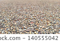 Brown pebble stone ground texture with shallow depth for architectural material design background 140555042