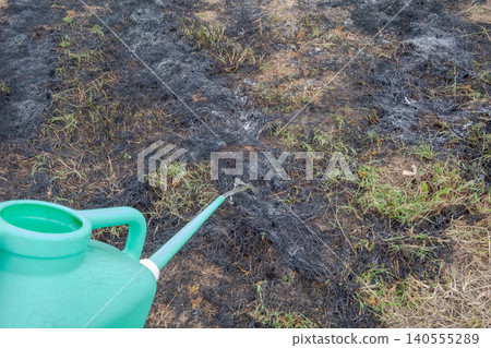 field, watering can, fiery 140555289