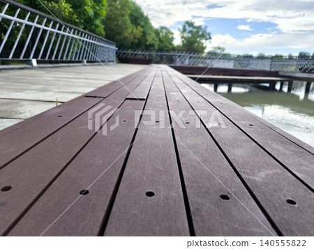 The Wooden Boardwalk Along Waterway The Wooden Boardwalk Along Waterway 140555822