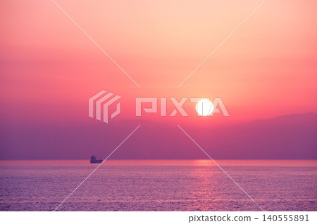 A beautiful sunrise viewed from the ferry. A beautiful sunrise viewed from the ferry. 140555891