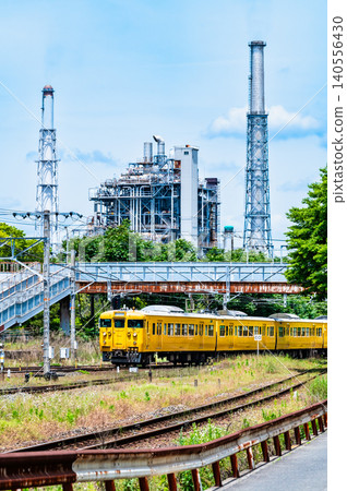 A 115 series train running on the Sanyo Main Line, with an oil refinery in the background, near Kushigahama Station. A 115 series train running on the Sanyo Main Line, with an oil refinery in the background, near Kushigahama Station. 140556430