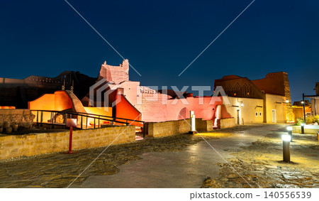 The historic mud-brick ruins of At-Turaif World Heritage Site illuminated with colorful lights at night in Diriyah, Saudi Arabia The historic mud-brick ruins of At-Turaif World Heritage Site illuminated with colorful lights at night in Diriyah, Saudi Arabia 140556539