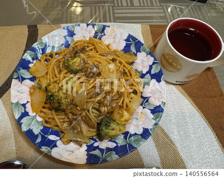 Homemade pasta and a mug of tea Homemade pasta and a mug of tea 140556564