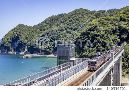 The limited express Hamakaze crossing the Amarube Bridge The limited express Hamakaze crossing the Amarube Bridge 140556701