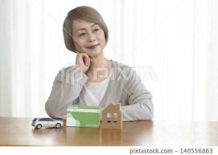 Senior women are planning their retirement funds in light of rising interest rates. Senior women are planning their retirement funds in light of rising interest rates. 140556863