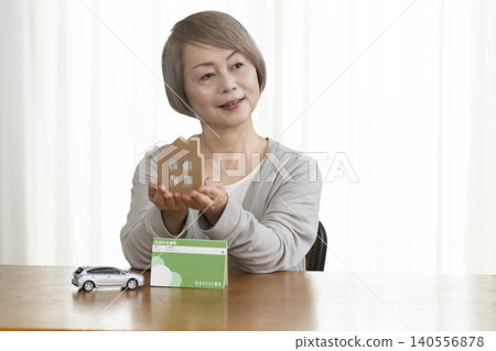 Senior women are planning their retirement funds in light of rising interest rates. Senior women are planning their retirement funds in light of rising interest rates. 140556878