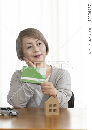 Senior women are planning their retirement funds in light of rising interest rates. Senior women are planning their retirement funds in light of rising interest rates. 140556927